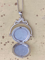 Silver Round Flower Locket - holds 1/2 inch diameter photo